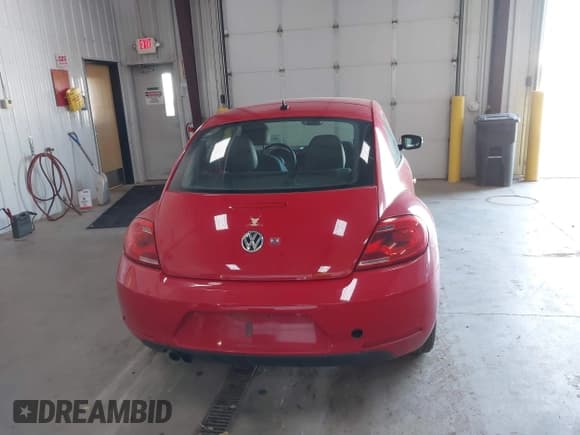 ✅ 2013 Volkswagen Beetle Fender Edition • VIN: 3VWJP7AT0DM693217 • Lot: 40677068. Listed on IAAI with 78,382 mi. Free auction sales archive from the USA and detailed vehicle history report at DreamBid. Image 16.