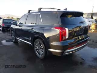 2023 Hyundai Palisade Calligraphy z VIN KM8R74GE6PU537689, wystawiony jako IAAI lot #41151656 z przebiegiem 23 392 mil mil oraz . Historia ofert i sprzedaży dostępna na DreamBid. Obrazek 3.