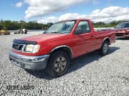 ✅ 1998 Nissan Frontier XE • VIN: 1N6DD21S2WC332138 • Lot: 90288645. Listed on Copart with 131,093 mi. Free auction sales archive from the USA and detailed vehicle history report at DreamBid. Image 1.