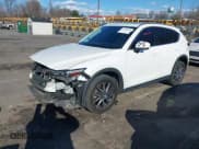 ✅ 2018 Mazda CX-5 Grand Touring • VIN: JM3KFBDM6J0435579 • Лот: 41208899. Опубликован ранее на IAAI с пробегом 131 212 миль. Бесплатный доступ к архиву аукционных продаж из США и подробный отчёт об истории автомобиля на DreamBid. Изображение 2.