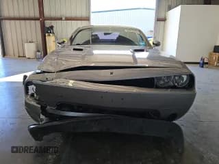 ✅ 2014 Dodge Challenger SXT • VIN: 2C3CDYAG2EH221277 • Lot: 83469934. Wystawiony na Copart z przebiegiem 164 499 mil. Bezpłatny archiwum sprzedaży aukcyjnych z USA i szczegółowy raport historii pojazdu na DreamBid. Zdjęcie 5.