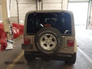 ✅ 2004 Jeep Wrangler Sahara • VIN: 1J4FA59S04P747727 • Lot: 43599384. Listed on IAAI with 190,912 mi. Free auction sales archive from the USA and detailed vehicle history report at DreamBid. Image 16.