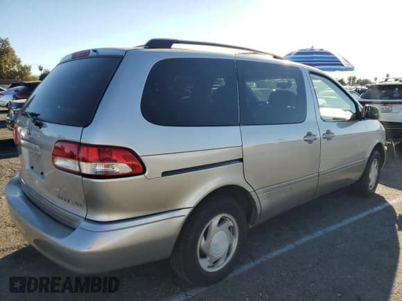 ✅ 2002 Toyota Sienna LE • VIN: 4T3ZF13C52U505287 • Lot: 77164884. Listed on Copart with Not provided. Free auction sales archive from the USA and detailed vehicle history report at DreamBid. Image 3.