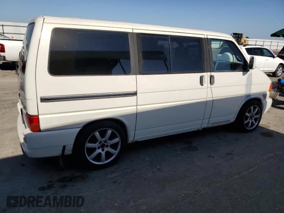 ✅ 1999 Volkswagen EuroVan GLS • VIN: WV2KH2705XH003038 • Lot: 61609125. Listed on Copart with 148,923 mi. Free auction sales archive from the USA and detailed vehicle history report at DreamBid. Image 3.