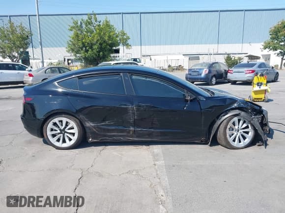 ✅ 2023 Tesla Model 3 Long Range • VIN: 5YJ3E1EB5PF603360 • Lot: 42649307. Listed on IAAI with Not provided. Free auction sales archive from the USA and detailed vehicle history report at DreamBid. Image 13.