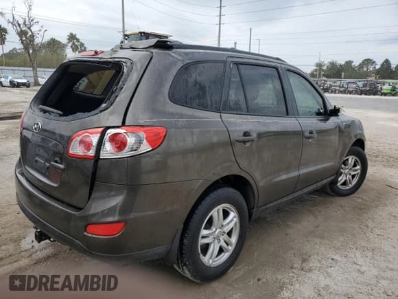 ✅ 2012 Hyundai Santa Fe GLS • VIN: 5XYZG4AG0CG153062 • Lot: 76452394. Listed on Copart with 99,354 mi. Free auction sales archive from the USA and detailed vehicle history report at DreamBid. Image 3.
