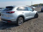 ✅ 2021 Mazda CX-9 Grand Touring • VIN: JM3TCADY6M0517827 • Lot: 43436121. Wystawiony na IAAI z przebiegiem 149 538 mil. Bezpłatny archiwum sprzedaży aukcyjnych z USA i szczegółowy raport historii pojazdu na DreamBid. Zdjęcie 4.