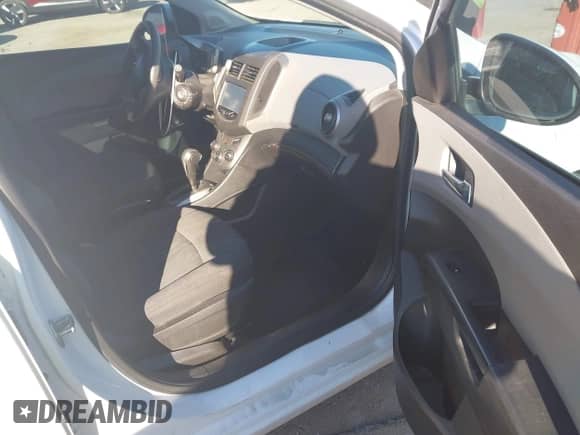 2015 Chevrolet Sonic LT with VIN 1G1JC6SH9F4100562, listed as a IAAI auction lot 43593493 with 127,498 mi miles and . Bid and sale history available at DreamBid. Image 5.