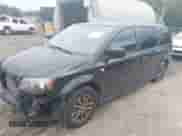 2014 Dodge Grand Caravan SXT z VIN 2C4RDGCG7ER450769, wystawiony jako IAAI lot #42731156 z przebiegiem 85 908 mil mil oraz . Historia ofert i sprzedaży dostępna na DreamBid. Obrazek 2.