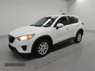 ✅ 2014 Mazda CX-5 Sport • VIN: JM3KE2BE7E0335639 • Лот: 91050715. Опубликован ранее на Copart с пробегом 239 960 миль. Бесплатный доступ к архиву аукционных продаж из США и подробный отчёт об истории автомобиля на DreamBid. Изображение 1.