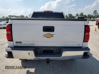 ✅ 2018 Chevrolet Silverado 1500 LT • VIN: 3GCUKREC8JG601897 • Лот: 72721394. Опубликован ранее на Copart с пробегом 143 452 миль. Бесплатный доступ к архиву аукционных продаж из США и подробный отчёт об истории автомобиля на DreamBid. Изображение 6.