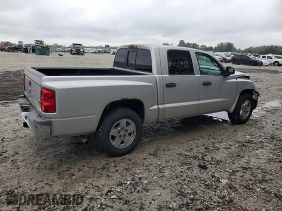 2005 Dodge Dakota SLT with VIN 1D7HE48N65S138476, listed as a Copart auction lot 73561614 with 83,364 mi miles and Salvage title. Bid and sale history available at DreamBid. Image 3.