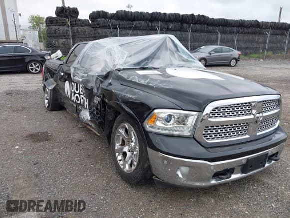 ✅ 2014 Ram 1500 Laramie • VIN: 1C6RR7VT2ES433864 • Lot: 42695626. Listed on IAAI with Not provided. Free auction sales archive from the USA and detailed vehicle history report at DreamBid. Image 1.