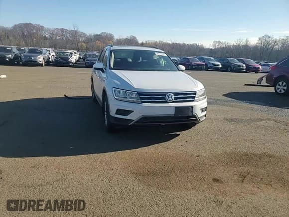 ✅ 2018 Volkswagen Tiguan SEL • VIN: 3VV2B7AX1JM118422 • Лот: 93213125. Опубликован ранее на Copart с пробегом 71 209 миль. Бесплатный доступ к архиву аукционных продаж из США и подробный отчёт об истории автомобиля на DreamBid. Изображение 13.