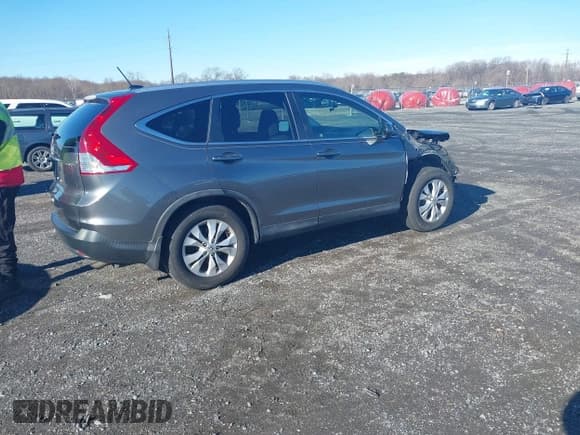 ✅ 2012 Honda CR-V EX-L • VIN: JHLRM4H77CC021180 • Lot: 43807202. Listed on IAAI with 149,599 mi. Free auction sales archive from the USA and detailed vehicle history report at DreamBid. Image 4.