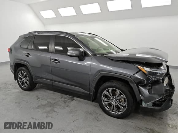 ✅ 2023 Toyota RAV4 Hybrid XLE Premium • VIN: JTMB6RFV9PD085163 • Лот: 84563665. Опубликован ранее на Copart с пробегом 115 711 миль. Бесплатный доступ к архиву аукционных продаж из США и подробный отчёт об истории автомобиля на DreamBid. Изображение 4.