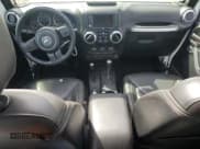 ✅ 2016 Jeep Wrangler Unlimited Rubicon Hard Rock • VIN: 1C4BJWFG7GL183225 • Lot: 69990335. Listed on Copart with 87,164 mi. Free auction sales archive from the USA and detailed vehicle history report at DreamBid. Image 8.