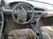 1998 Chevrolet Malibu LS z VIN 1G1NE52M0W6253001, wystawiony jako Copart lot #80629834 z przebiegiem Nie podano mil oraz Czysty tytuł • Clean title. Historia ofert i sprzedaży dostępna na DreamBid. Obrazek 8.