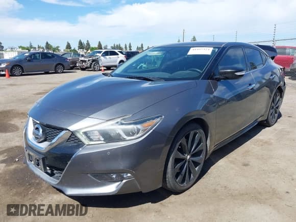 ✅ 2017 Nissan Maxima S • VIN: 1N4AA6AP2HC446604 • Lot: 41997324. Listed on IAAI with 97,657 mi. Free auction sales archive from the USA and detailed vehicle history report at DreamBid. Image 2.