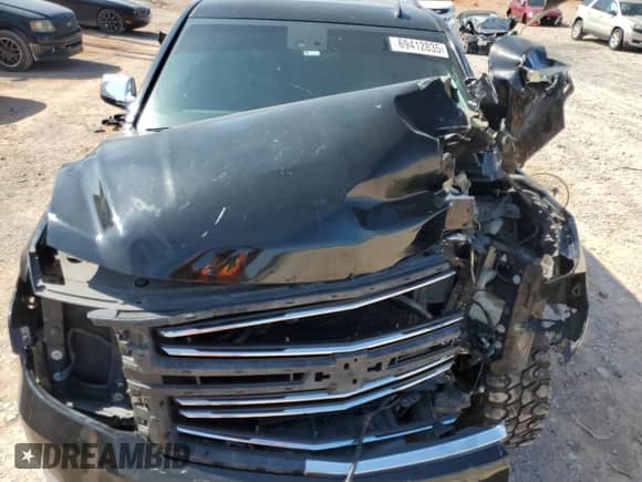 2015 Chevrolet Tahoe LTZ with VIN 1GNSKCKC6FR170659, listed as a Copart auction lot 69412835 with 252,198 mi miles and Salvage title. Bid and sale history available at DreamBid. Image 12.