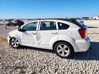 ✅ 2010 Dodge Caliber SXT • VIN: 1B3CB4HA4AD534898 • Lot: 91304765. Listed on Copart with 249,576 mi. Free auction sales archive from the USA and detailed vehicle history report at DreamBid. Image 2.