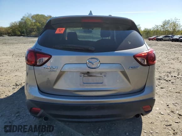 ✅ 2013 Mazda CX-5 Touring • VIN: JM3KE4CEXD0164913 • Лот: 87435165. Опубликован ранее на Copart с пробегом Не указан. Бесплатный доступ к архиву аукционных продаж из США и подробный отчёт об истории автомобиля на DreamBid. Изображение 6.