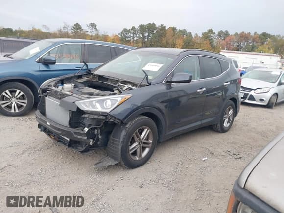 ✅ 2017 Hyundai Santa Fe 2.4L • VIN: 5NMZU3LB6HH027984 • Lot: 43505016. Listed on IAAI with 138,308 mi. Free auction sales archive from the USA and detailed vehicle history report at DreamBid. Image 17.