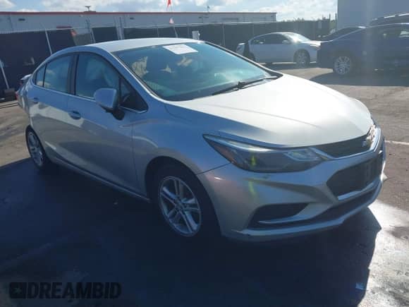 2016 Chevrolet Cruze LT z VIN 1G1BE5SM6G7266382, wystawiony jako IAAI lot #43297841 z przebiegiem 182 239 mil mil oraz . Historia ofert i sprzedaży dostępna na DreamBid. Obrazek 1.