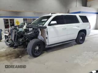 2015 Chevrolet Tahoe Commercial с VIN 1GNLC2EC0FR304041, выставлен на аукционе Copart как лот 82434935 с пробегом 122 826 миль миль и Списание • Salvage title. История ставок и продаж доступна на DreamBid. Изображение 1.