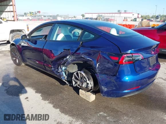 ✅ 2023 Tesla Model 3 • VIN: 5YJ3E1EA9PF638118 • Lot: 43272740. Listed on IAAI with 30,598 mi. Free auction sales archive from the USA and detailed vehicle history report at DreamBid. Image 3.