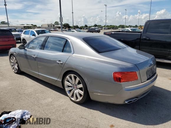 ✅ 2015 Bentley Flying Spur V8 • VIN: SCBET9ZA9FC043128 • Lot: 73826634. Listed on Copart with Not provided. Free auction sales archive from the USA and detailed vehicle history report at DreamBid. Image 2.