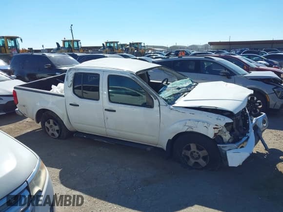✅ 2005 Nissan Frontier LE • VIN: 1N6AD07U05C424881 • Lot: 43605829. Listed on IAAI with 199,731 mi. Free auction sales archive from the USA and detailed vehicle history report at DreamBid. Image 14.