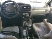 ✅ 1999 Suzuki Grand Vitara JLX • VIN: JS3TD62V0X4106837 • Лот: 67197155. Опубликован ранее на Copart с пробегом Не указан. Бесплатный доступ к архиву аукционных продаж из США и подробный отчёт об истории автомобиля на DreamBid. Изображение 8.