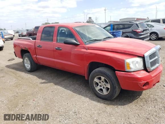 2006 Dodge Dakota SLT with VIN 1D7HE48K76S701994, listed as a Copart auction lot 72152274 with 145,040 mi miles and Salvage title. Bid and sale history available at DreamBid. Image 4.