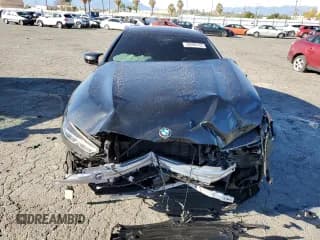 ✅ 2023 BMW 8 Series M850i • VIN: WBAGV8C06PCL57473 • Lot: 39398193. Listed on Copart with Not provided. Free auction sales archive from the USA and detailed vehicle history report at DreamBid. Image 5.