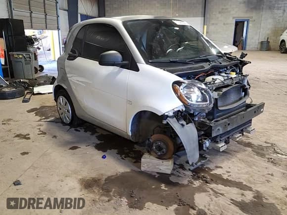 ✅ 2016 Smart fortwo Passion • VIN: WMEFJ5DA9GK127823 • Lot: 71844205. Wystawiony na Copart z przebiegiem 65 443 mil. Bezpłatny archiwum sprzedaży aukcyjnych z USA i szczegółowy raport historii pojazdu na DreamBid. Zdjęcie 14.