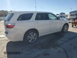 ✅ 2012 Dodge Durango R/T • VIN: 1C4SDHCT5CC321990 • Лот: 91027935. Опубликован ранее на Copart с пробегом 157 412 миль. Бесплатный доступ к архиву аукционных продаж из США и подробный отчёт об истории автомобиля на DreamBid. Изображение 3.
