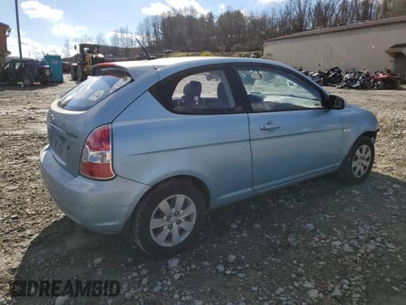 2009 Hyundai Accent Auto GS z VIN KMHCM36C19U127295, wystawiony jako Copart lot #79997944 z przebiegiem 236 362 mil mil oraz Szkoda całkowita • Salvage title. Historia ofert i sprzedaży dostępna na DreamBid. Obrazek 3.