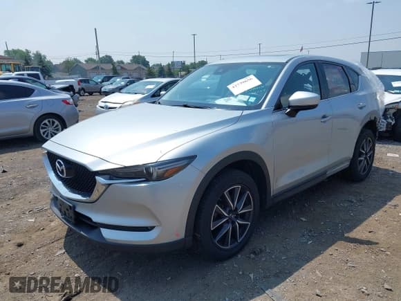 ✅ 2017 Mazda CX-5 Grand Touring • VIN: JM3KFBDL6H0220933 • Lot: 42739656. Wystawiony na IAAI z przebiegiem 82 211 mil. Bezpłatny archiwum sprzedaży aukcyjnych z USA i szczegółowy raport historii pojazdu na DreamBid. Zdjęcie 19.