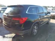 ✅ 2017 Honda Pilot EX-L • VIN: 5FNYF6H51HB015320 • Lot: 43135819. Listed on IAAI with 151,488 mi. Free auction sales archive from the USA and detailed vehicle history report at DreamBid. Image 4.