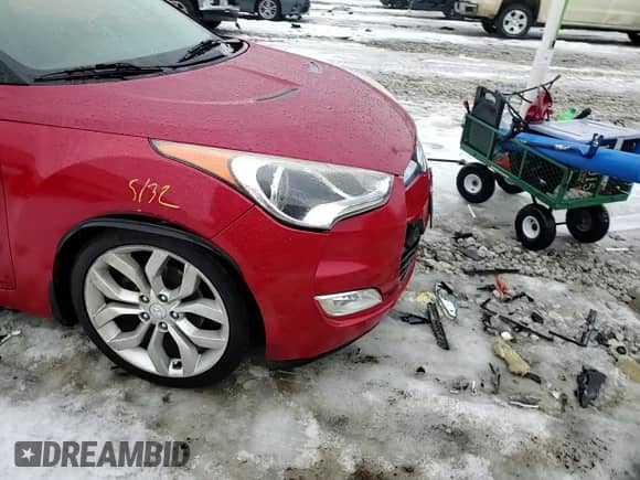 2012 Hyundai Veloster w/Red Int z VIN KMHTC6AD4CU077956, wystawiony jako Copart lot #43504505 z przebiegiem 103 183 mil mil oraz Szkoda całkowita • Salvage title. Historia ofert i sprzedaży dostępna na DreamBid. Obrazek 11.