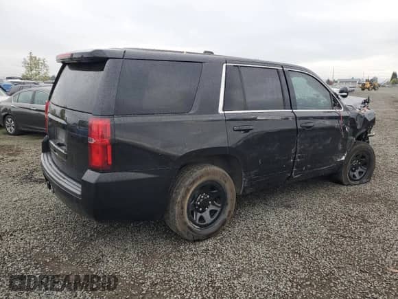 2020 Chevrolet Tahoe Commercial with VIN 1GNSKDEC1LR154138, listed as a Copart auction lot 85511665 with 125,307 mi miles and Salvage title. Bid and sale history available at DreamBid. Image 3.