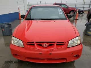 2000 Hyundai Accent z VIN KMHCF35G2YU013092, wystawiony jako Copart lot #86220124 z przebiegiem 153 844 mil mil oraz Szkoda całkowita • Salvage title. Historia ofert i sprzedaży dostępna na DreamBid. Obrazek 5.