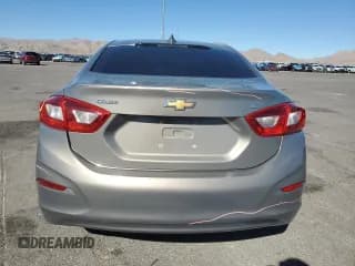 ✅ 2017 Chevrolet Cruze LT • VIN: 1G1BE5SM2H7210036 • Lot: 90130525. Listed on Copart with 66,230 mi. Free auction sales archive from the USA and detailed vehicle history report at DreamBid. Image 6.