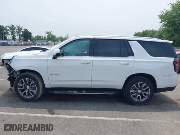 ✅ 2023 Chevrolet Tahoe LT • VIN: 1GNSKNKD7PR119905 • Lot: 42487598. Listed on IAAI with 25,440 mi. Free auction sales archive from the USA and detailed vehicle history report at DreamBid. Image 13.