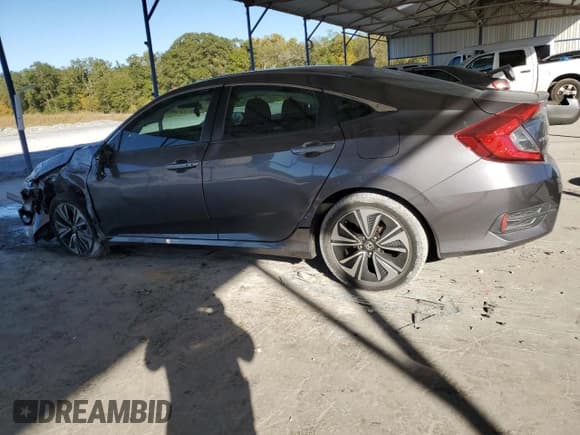 ✅ 2016 Honda Civic EX-T • VIN: 19XFC1F31GE039237 • Лот: 82703325. Опубликован ранее на Copart с пробегом 77 181 миль. Бесплатный доступ к архиву аукционных продаж из США и подробный отчёт об истории автомобиля на DreamBid. Изображение 2.