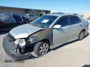 ✅ 2004 Toyota Corolla CE • VIN: 1NXBR32E14Z203918 • Lot: 43013302. Listed on IAAI with 244,429 mi. Free auction sales archive from the USA and detailed vehicle history report at DreamBid. Image 2.