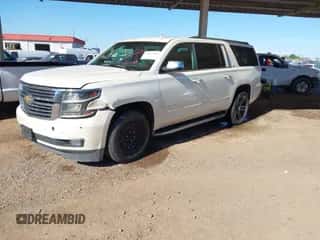 2015 Chevrolet Suburban LTZ z VIN 1GNSKKKCXFR729558, wystawiony jako IAAI lot #43487566 z przebiegiem 109 722 mil mil oraz . Historia ofert i sprzedaży dostępna na DreamBid. Obrazek 2.