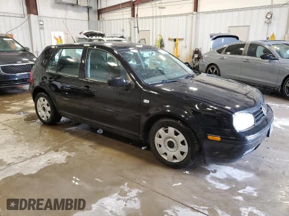 ✅ 2004 Volkswagen Golf GL • VIN: 9BWFL61J744007916 • Lot: 55312295. Listed on Copart with 196,387 mi. Free auction sales archive from the USA and detailed vehicle history report at DreamBid. Image 4.