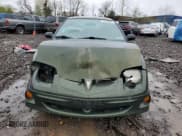 ✅ 2001 Pontiac Sunfire SE • VIN: 1G2JB524117233717 • Lot: 52409085. Wystawiony na Copart z przebiegiem Nie podano. Bezpłatny archiwum sprzedaży aukcyjnych z USA i szczegółowy raport historii pojazdu na DreamBid. Zdjęcie 5.